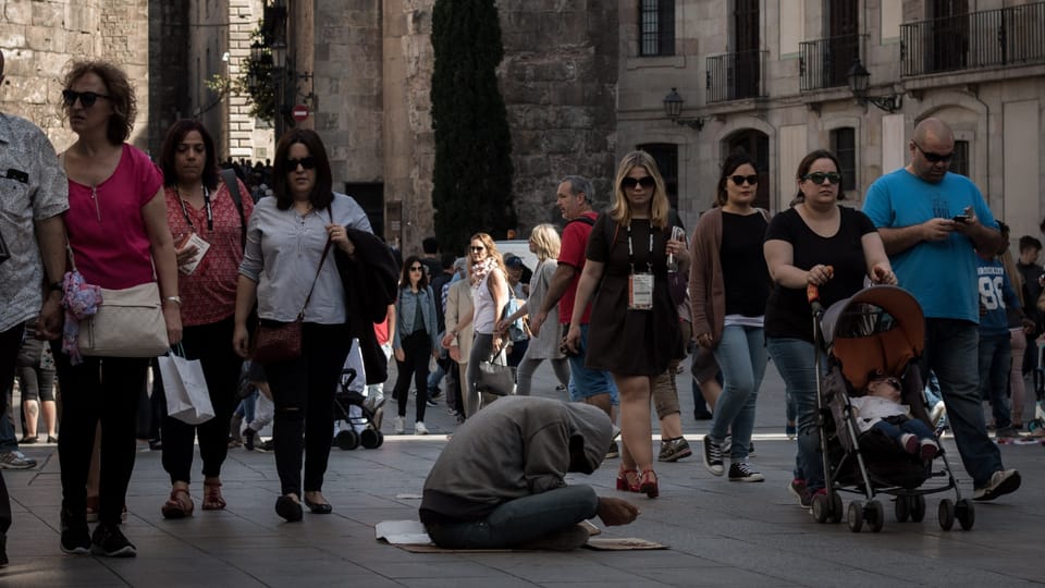 homeless person in crowd