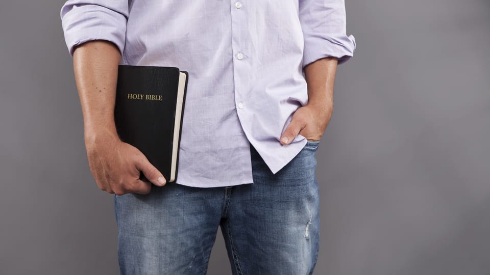 holding Bible