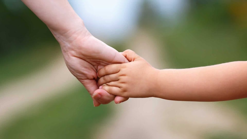 child with mother