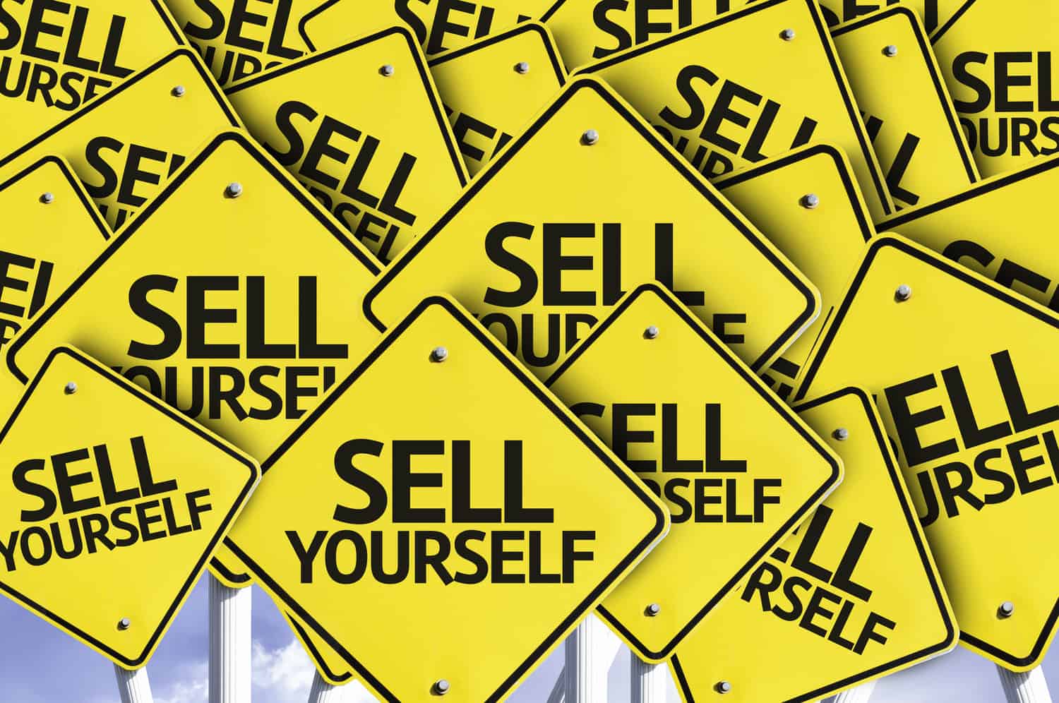 Sell Yourself written on multiple road sign
