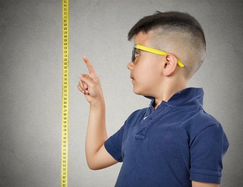child and measuring tape